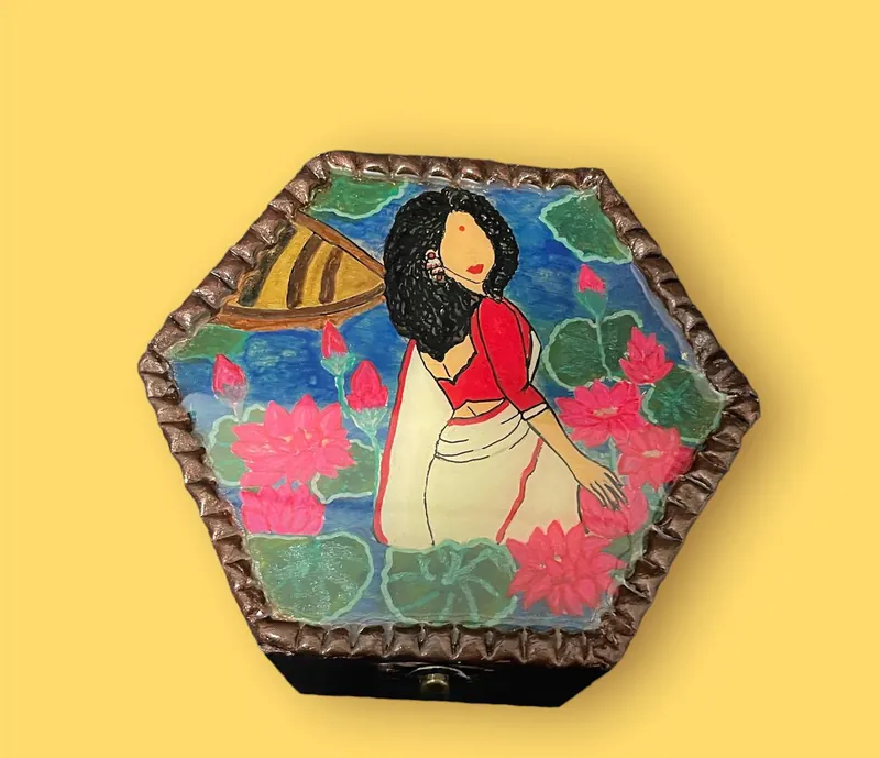 Hexagonal hand-painted jewellery box with a woman in a saree among lotus flowers
